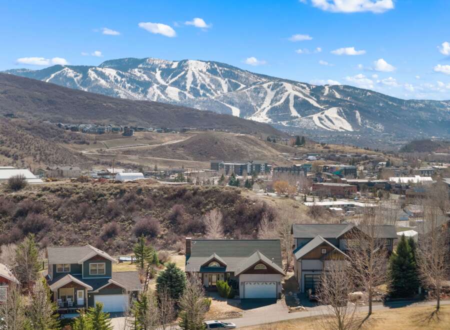 Nestled in a picturesque mountain setting, this property offers stunning views of the snow-capped peaks.