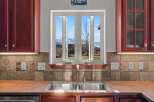 This stunning kitchen boasts a bright and airy atmosphere, perfect for culinary creations.