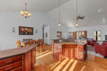 This stunning property boasts a spacious kitchen with a large island, perfect for entertaining.
