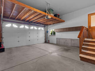 This spacious garage offers ample storage and functionality.