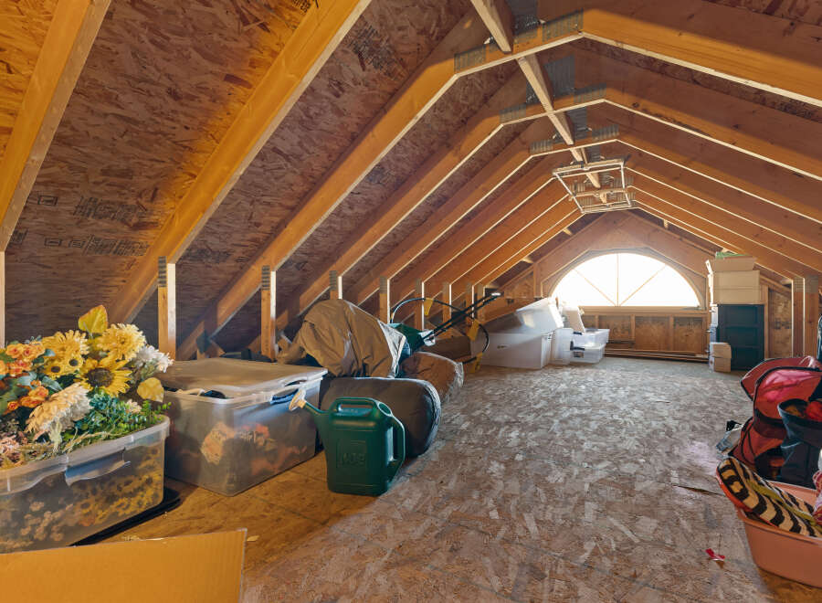 Discover the potential of this spacious attic, perfect for storage or conversion.