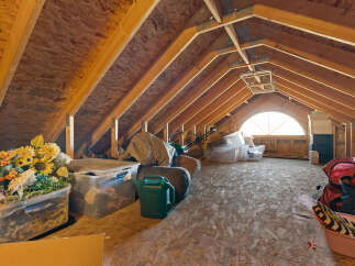 Discover the potential of this spacious attic, perfect for storage or conversion.