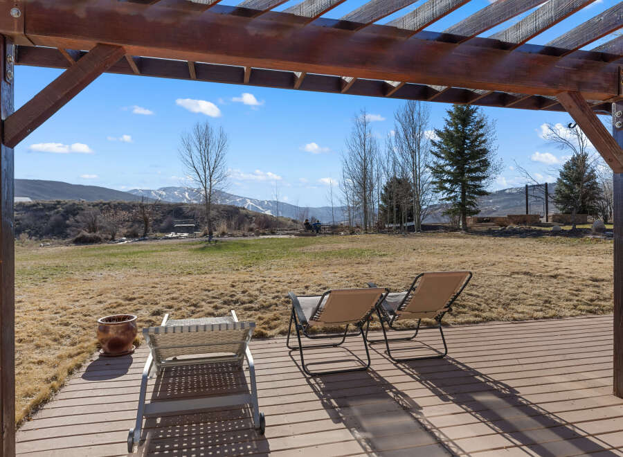 Enjoy breathtaking mountain views from this stunning outdoor space.