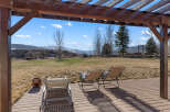 Enjoy breathtaking mountain views from this stunning outdoor space.