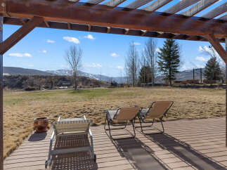 Enjoy breathtaking mountain views from this stunning outdoor space.
