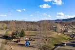 This property offers a serene setting with a playground, perfect for families.