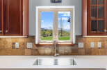 This stunning kitchen boasts a bright and airy atmosphere, perfect for culinary creations and entertaining.