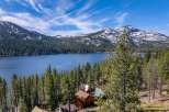 Discover your dream retreat nestled amidst the serene beauty of the mountains and a pristine lake.