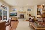 Step into luxury with this stunning property featuring a cozy fireplace, perfect for those chilly evenings.