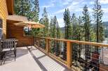 Enjoy breathtaking views from this stunning property, featuring a spacious deck perfect for relaxation.