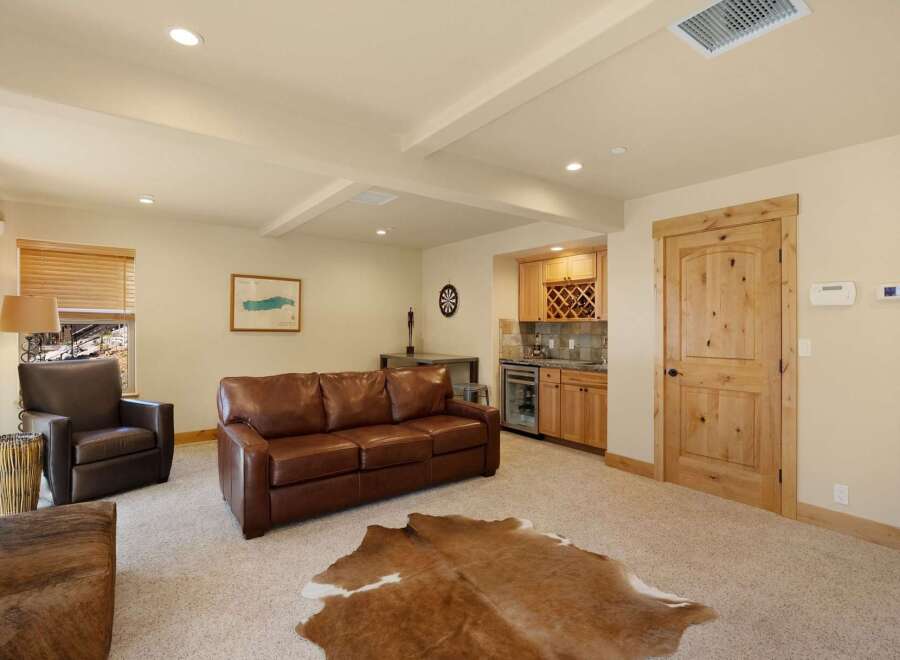 Step into luxury with this stunning property, featuring a spacious living area perfect for entertaining.