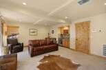 Step into luxury with this stunning property, featuring a spacious living area perfect for entertaining.