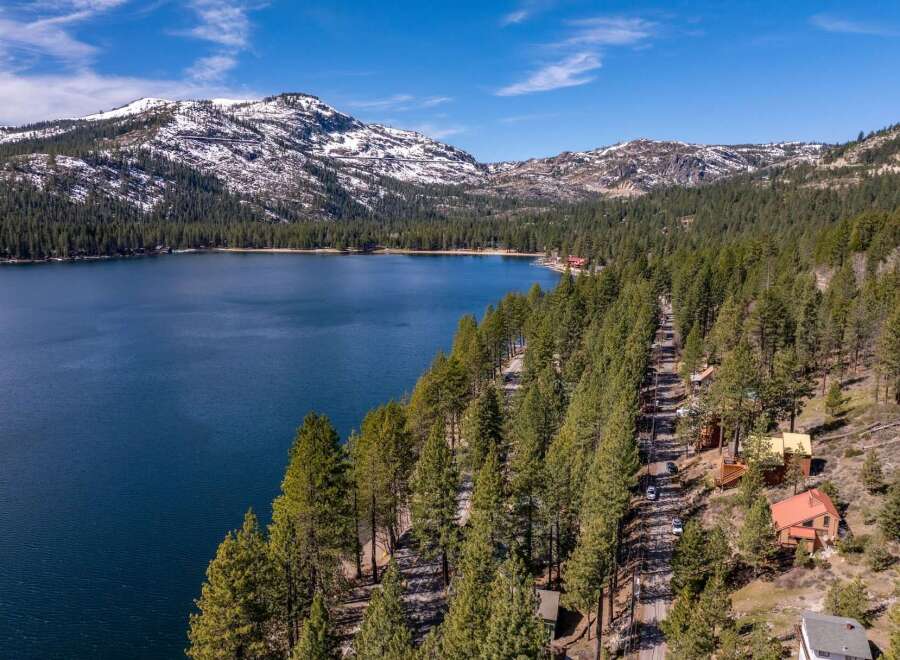 Discover the tranquility of lakeside living with this stunning property.