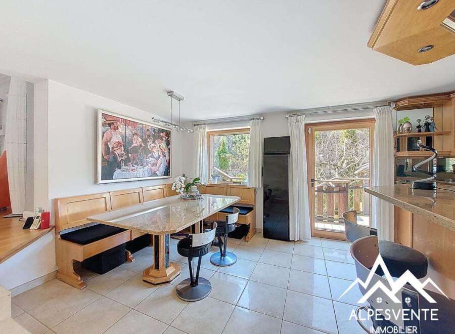 This stunning property features a bright and airy dining area, perfect for entertaining.
