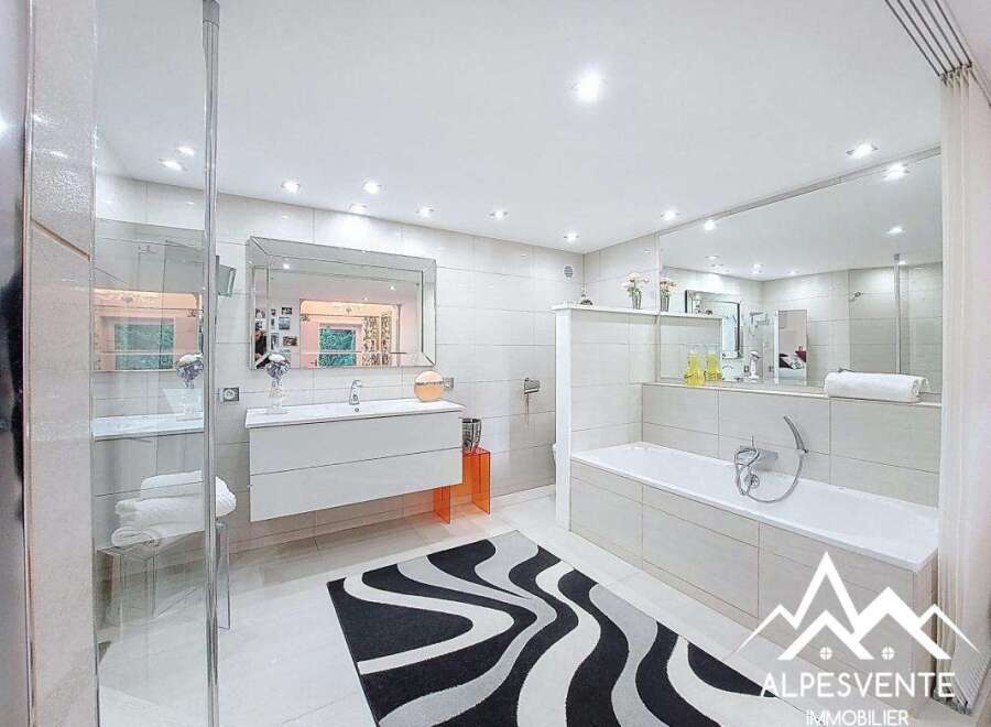 Discover luxury in this stunning bathroom! Featuring a sleek, modern design with a spacious layout, this bathroom offers a spa-like experience.