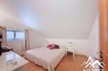 Discover this charming bedroom with a cozy ambiance, perfect for relaxation.