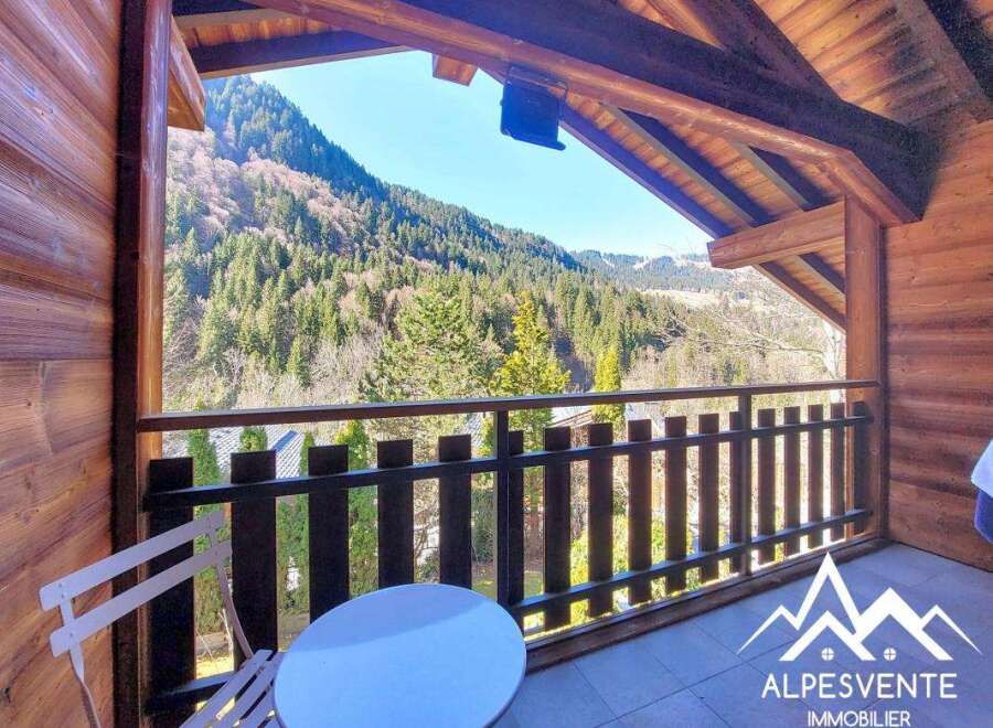 Enjoy breathtaking mountain views from this charming balcony.