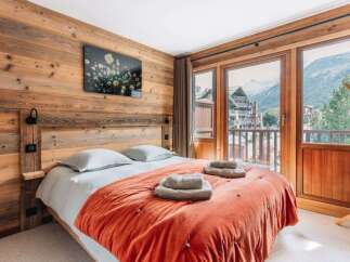 Experience the ultimate in alpine luxury with this stunning bedroom.
