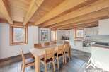 Discover the charm of this stunning property, featuring a beautifully designed dining area and kitchen.