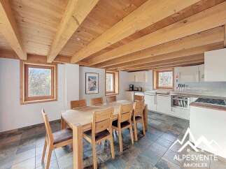 Discover the charm of this stunning property, featuring a beautifully designed dining area and kitchen.