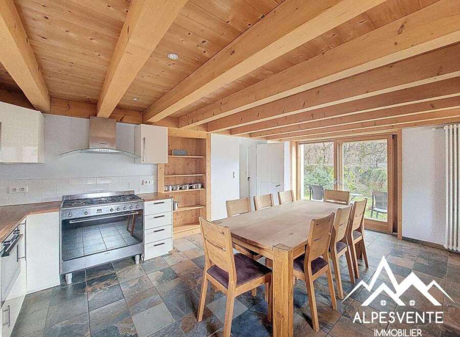 This stunning property boasts a beautifully designed kitchen with modern appliances and ample counter space.