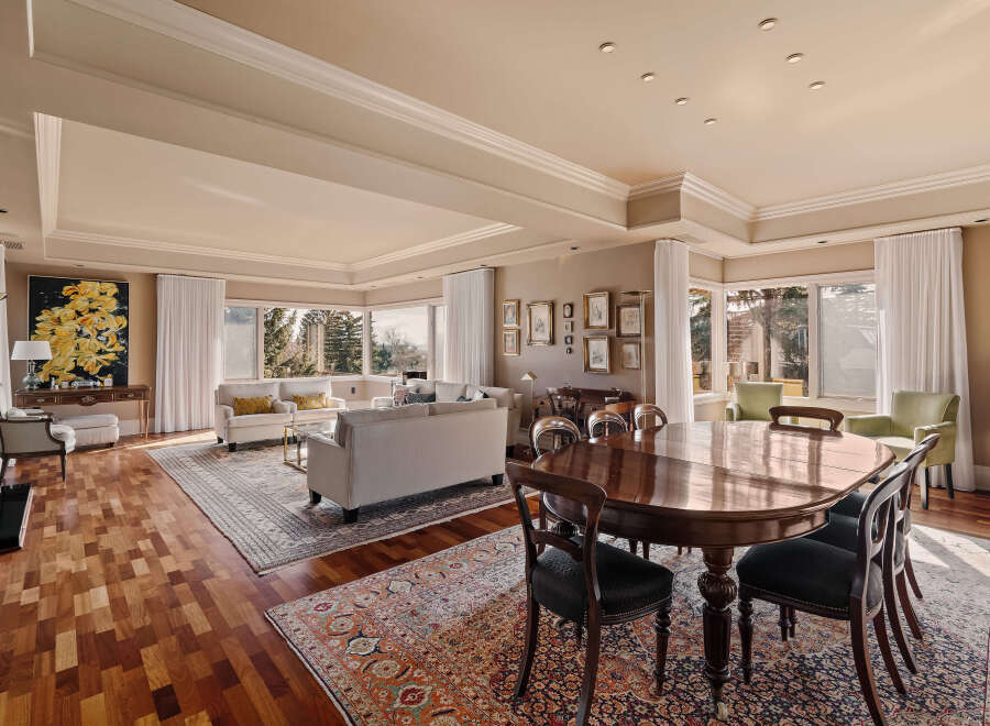 This stunning property boasts a spacious living area with a beautiful dining space, perfect for entertaining.