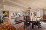 This stunning property boasts a spacious living area with a beautiful dining space, perfect for entertaining.
