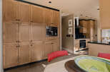 This stunning kitchen boasts custom cabinetry and high-end appliances, perfect for the discerning chef.