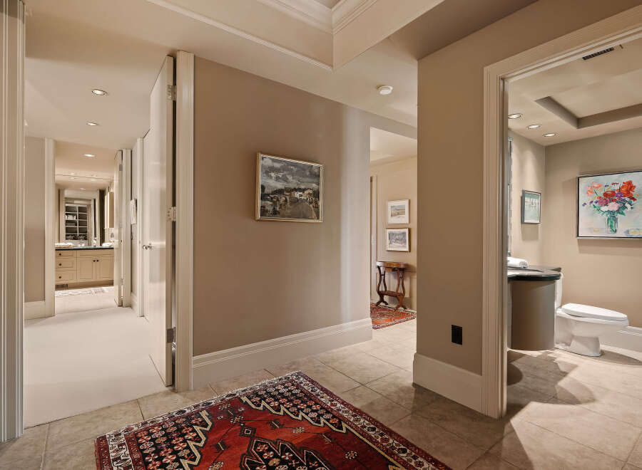 Step into luxury with this stunning property, featuring elegant hallways and exquisite design.