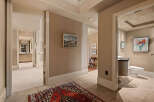 Step into luxury with this stunning property, featuring elegant hallways and exquisite design.