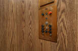 This image showcases an elevator control panel, a common feature in multi-story buildings.