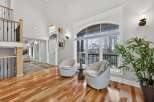 Step into luxury with this stunning property, showcasing a bright and airy living space.