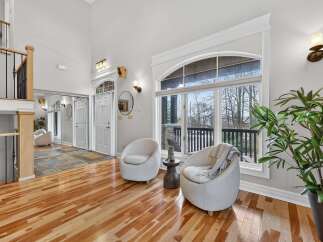 Step into luxury with this stunning property, showcasing a bright and airy living space.