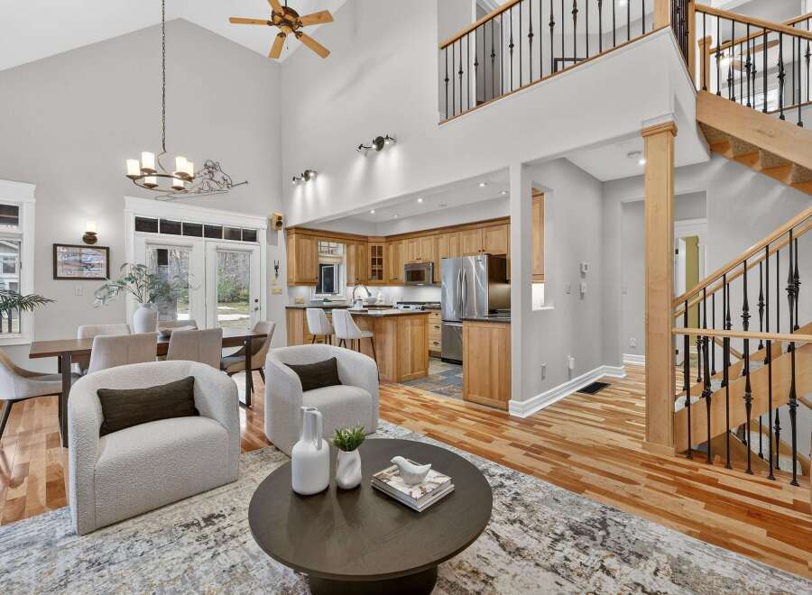 Step into luxury with this stunning property featuring a spacious open floor plan and soaring ceilings.