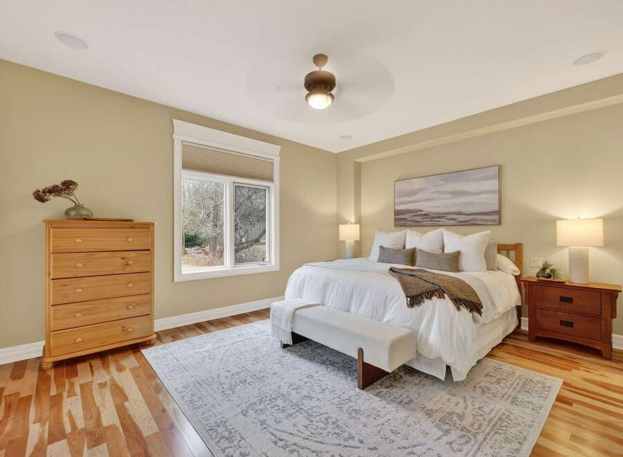 Step into a serene bedroom retreat, where comfort meets elegance.