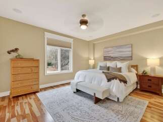 Step into a serene bedroom retreat, where comfort meets elegance.