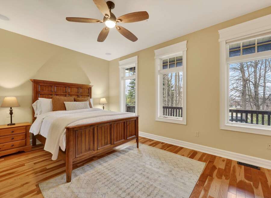 This stunning bedroom boasts a warm and inviting atmosphere, perfect for relaxation.