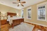 This stunning bedroom boasts a warm and inviting atmosphere, perfect for relaxation.