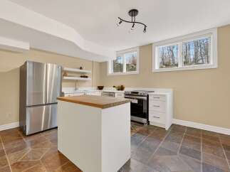 This stunning kitchen boasts modern design and functionality.