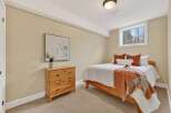 This cozy bedroom offers a warm and inviting atmosphere, perfect for relaxation.