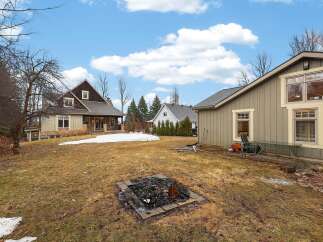 This stunning property boasts a spacious backyard, perfect for outdoor gatherings and relaxation.