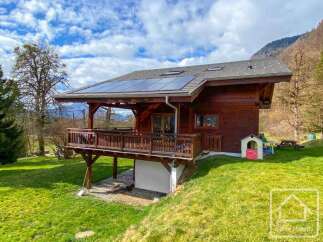 Discover this charming wooden chalet nestled in a picturesque setting, perfect for a serene getaway.
