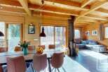 Experience the warmth of this stunning wooden cabin, perfect for a cozy retreat.