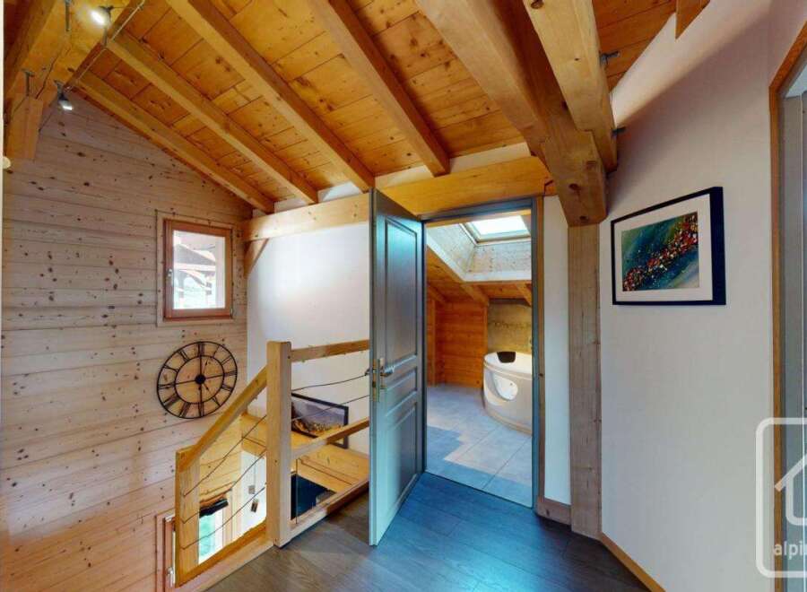 Step into this charming chalet and be captivated by its rustic elegance.