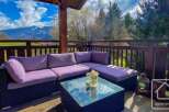 Enjoy breathtaking mountain views from this stunning outdoor living space.