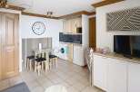 Discover this charming property featuring a well-lit living space, perfect for comfortable living.