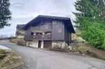 Discover this charming chalet nestled in a serene mountain setting, perfect for a peaceful retreat.
