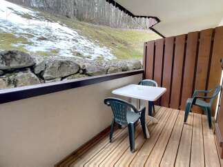 Enjoy the tranquility of this charming balcony, perfect for relaxing and taking in the scenic views.