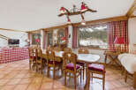 Experience the charm of this stunning property, featuring a spacious dining area perfect for gatherings.