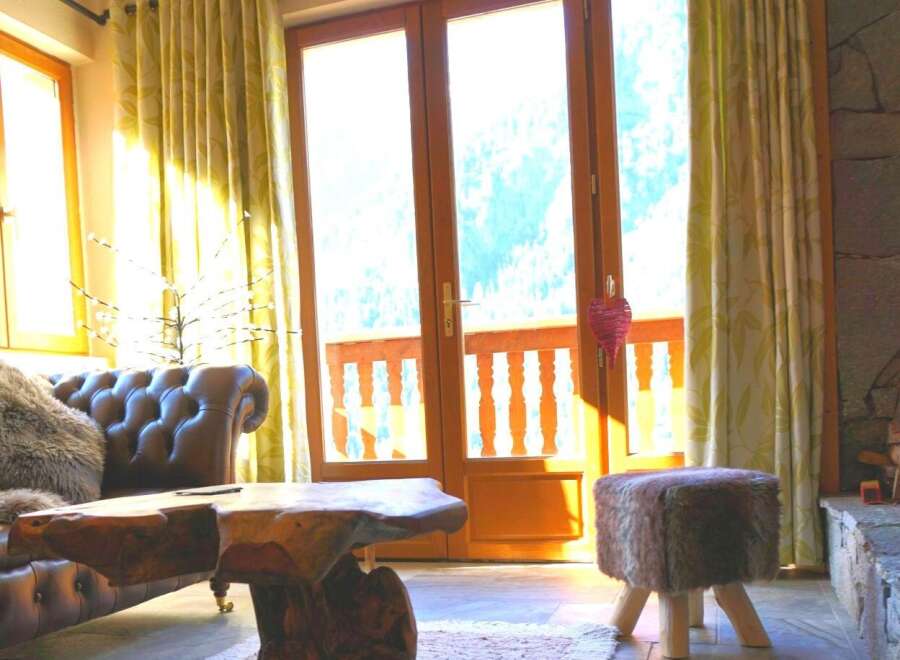Experience the charm of this cozy living space, perfect for relaxation and entertaining.